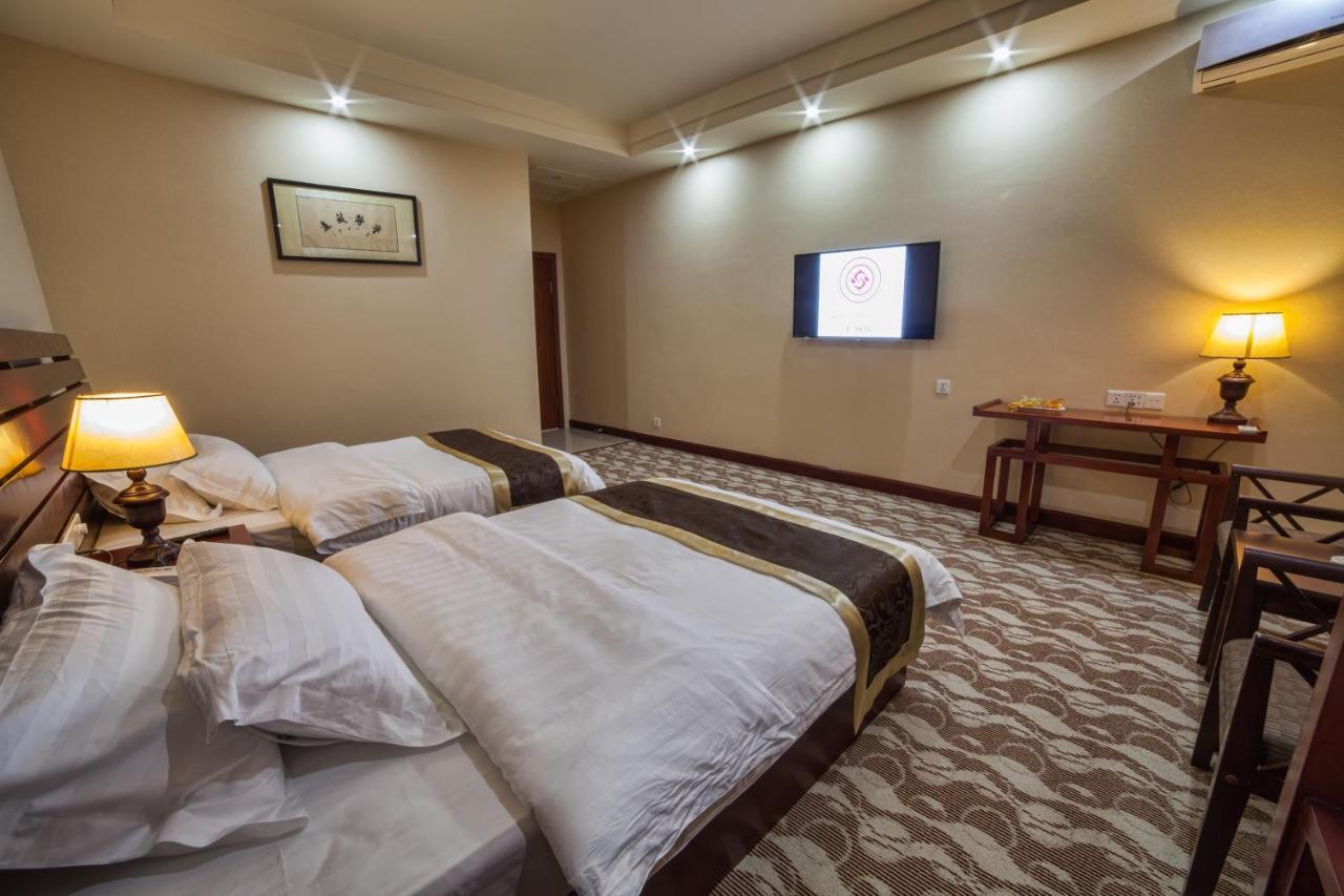 Hotel Shanghai City Osh Exterior photo